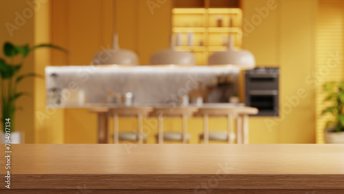 Wooden table top on blur kitchen room background,yellow kitchen room- 3D rendering