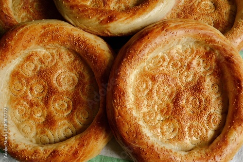 Beautiful flatbreads in close-up. Flatbread is the main type of bread in Central Asia. Delicious, fragrant bread.