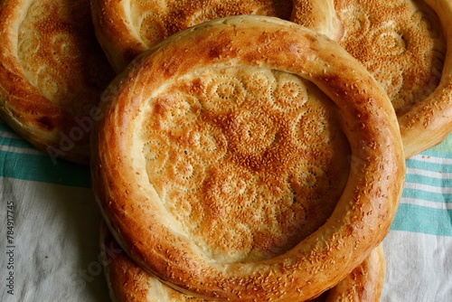 Beautiful flatbreads in close-up. Flatbread is the main type of bread in Central Asia. Delicious, fragrant bread.