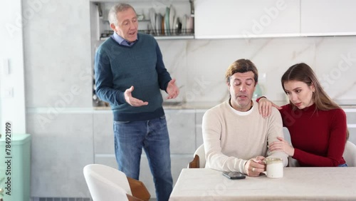Old man quarreling and arguing with couple, annoyed and emotional. Old man quarreling with couple. High quality 4k footage