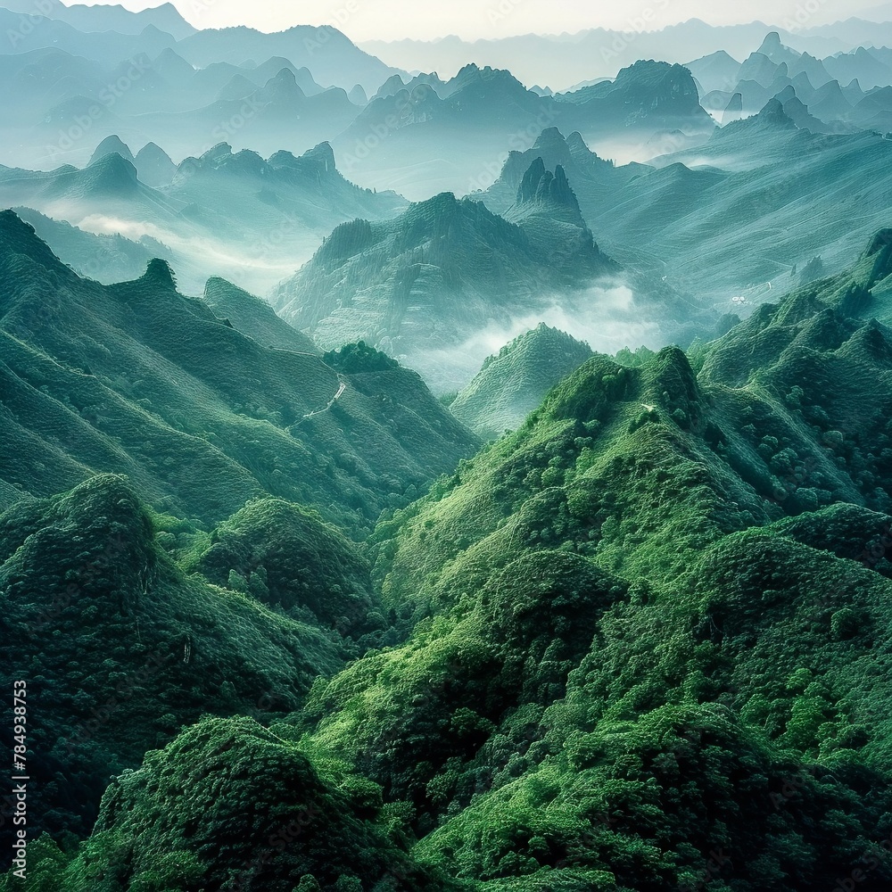 view of the green mountain ranges from above, in the style of mysterious backdrops, uhd image - obrazy, fototapety, plakaty 
