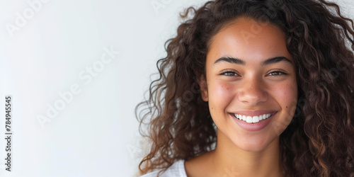 Young black African American woman smiling with copy space. Happiness, dark skin tone, white teeth, smooth skin, natural beauty, joyful concept