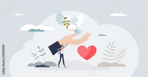 Nonprofit organization for peace or social solidarity tiny person concept. Humanitarian aid as part of philanthropy and generosity from non profit company vector illustration. Community care activist photo
