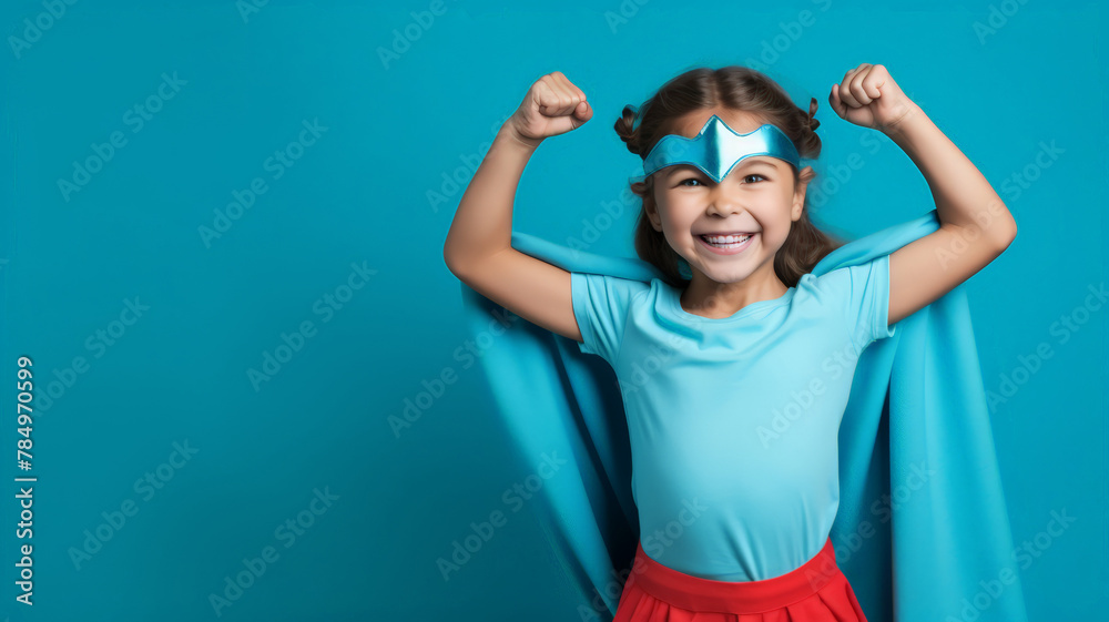 A children girl in colorful superhero costumes outfits having fun and grimacing ,a Children day