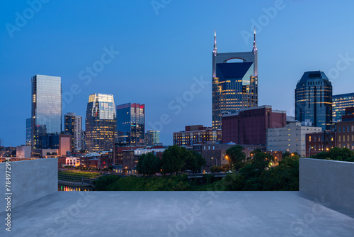 Skyscrapers Cityscape Downtown, Nashville Skyline Buildings. Beautiful Real Estate. Night time. Empty rooftop View. Success concept.