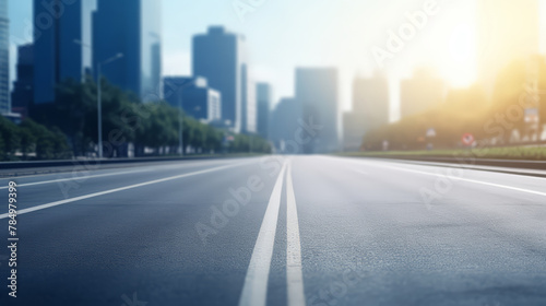 Selective focus   Empty road floor surface with modern city landmark buildings  a safety on road