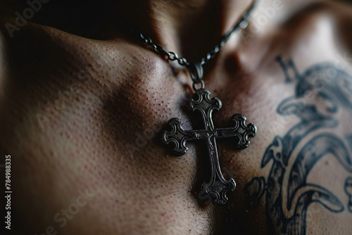 christian cross on the male chest photo