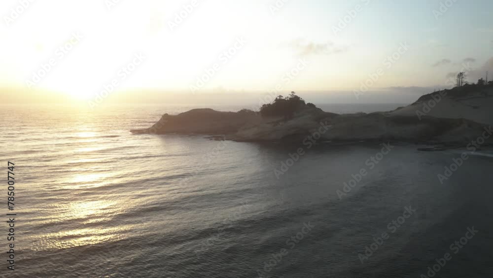 Cape Kiwanda From Pacific City Beach During Golden Hour In Oregon, USA. - aerial shot