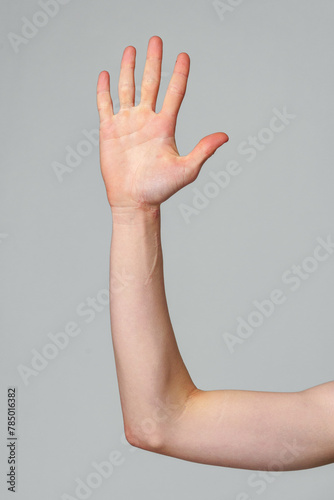Person With Hand Raised Up in the Air