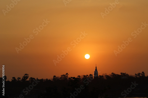 A sun look like a beautiful orange dot