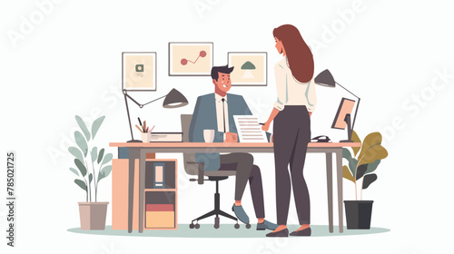 Business executive with a secretary at his desk 