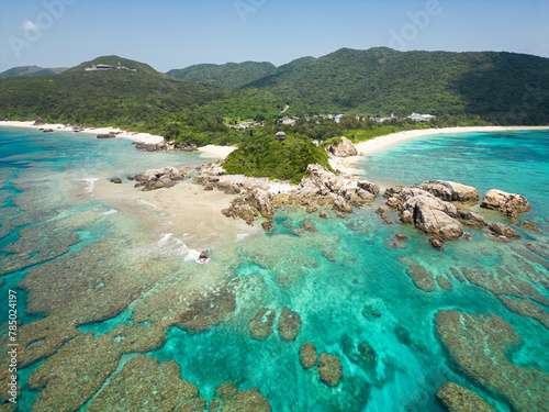 Obraz na płótnie Okinawa, Japan: Aerial view of the Aharen beach in the tropical Tokashiki island in Okinawa in the Pacific Ocean. w salonie