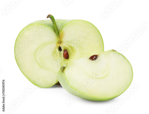 Pieces of ripe green apple isolated on white