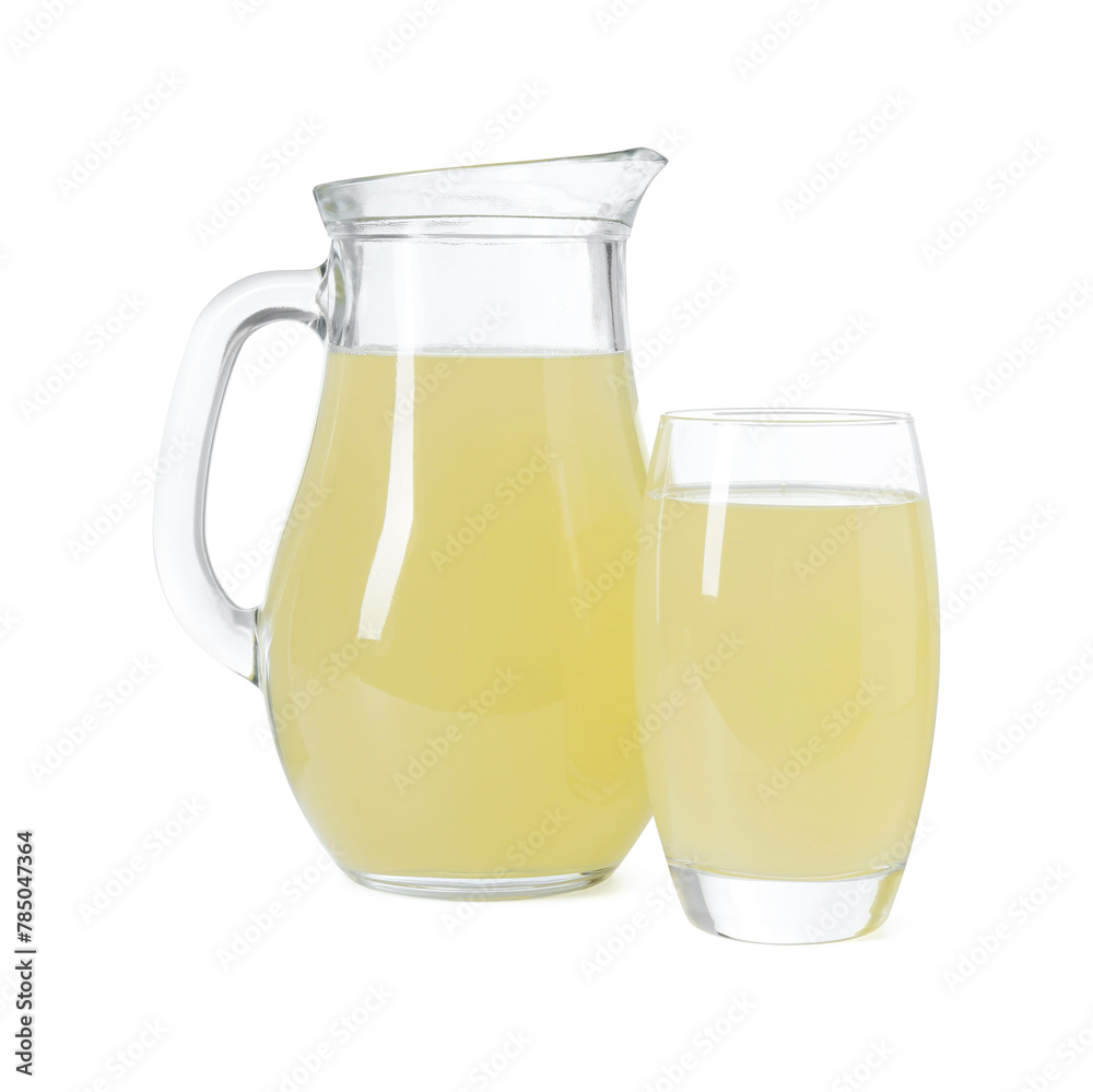 Refreshing lemon juice in jug and glass isolated on white Refreshing lemon juice in jug and glass isolated on white