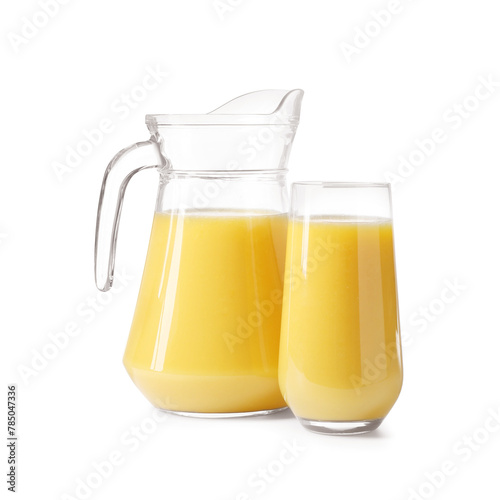 Refreshing orange juice in glass and jug isolated on white