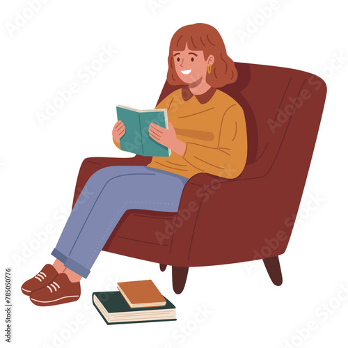 Young woman sitting in armchair and reading a book.