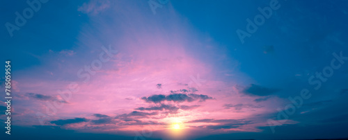 Colorful cloudy sky at sunset. Sky texture. Abstract nature background. Horizontal banner