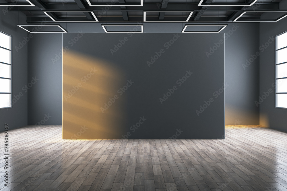 Obraz premium Modern empty gallery interior with mock up place on dark wall, wooden, flooring and windows with daylight. 3D Rendering.