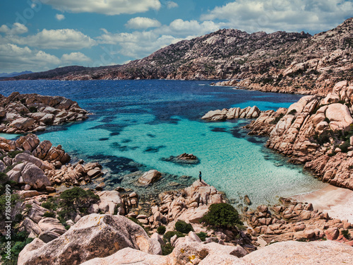 Una donna in una bellissima spiaggia in Sardegna photo