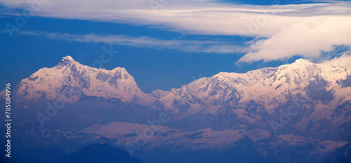 Kanchenjunga range against blue sky