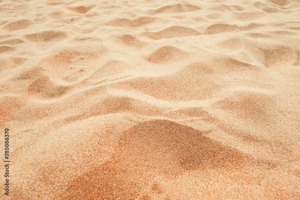 Beach sand background, close up, Low angle view of brown sandy surface in tropical resort. Vacation and summer holiday concept. - obrazy, fototapety, plakaty 