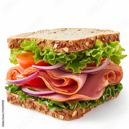 A close-up image showcasing a stacked deli sandwich with ham, lettuce, tomato, and onions on seeded bread.