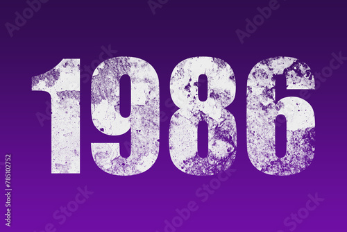 flat white grunge number of 1986 on purple background.