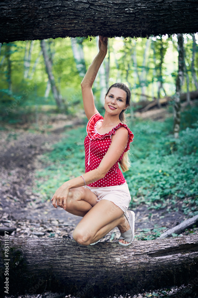Portrait of a young woman in the park. Summer activity Portrait of a young woman in the park. Summer activity