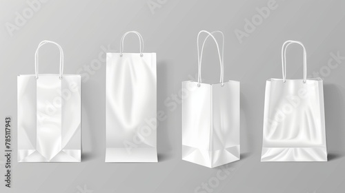 Paper eco bags different shapes. Mockup of a blank cardboard bag with handles isolated on a gray background for corporate design.