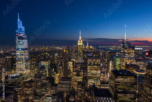 Sunset view of New York City skyline from a rooftop  Usa 
