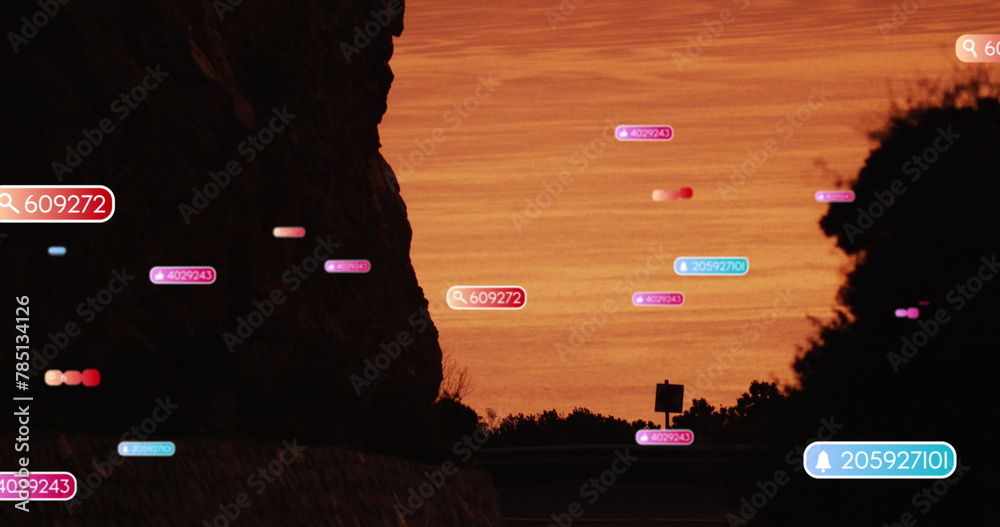 Naklejka premium Image of social media icons over sunset landscape