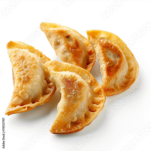 Close-up of four crispy fried dumplings on white background. Flat lay, top view. Generative AI