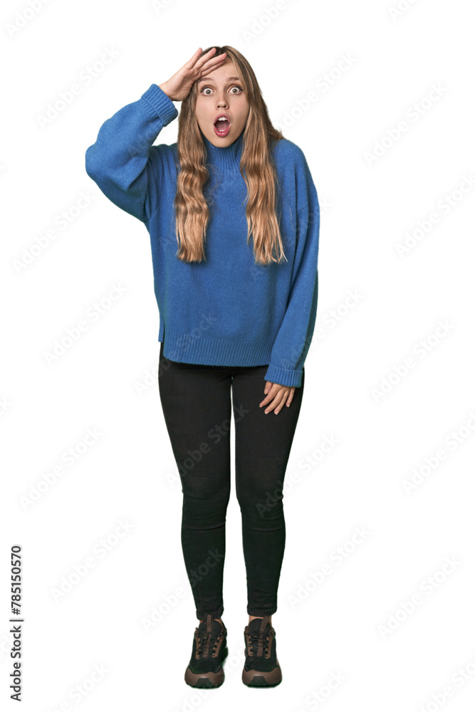 Studio portrait of a blonde Caucasian woman shouts loud, keeps eyes opened and hands tense. Studio portrait of a blonde Caucasian woman shouts loud, keeps eyes opened and hands tense.