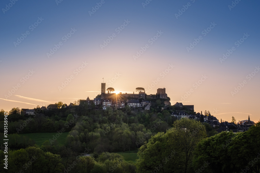 Sunrise over the medieval fortified village of Turenne in the Correze department of France
