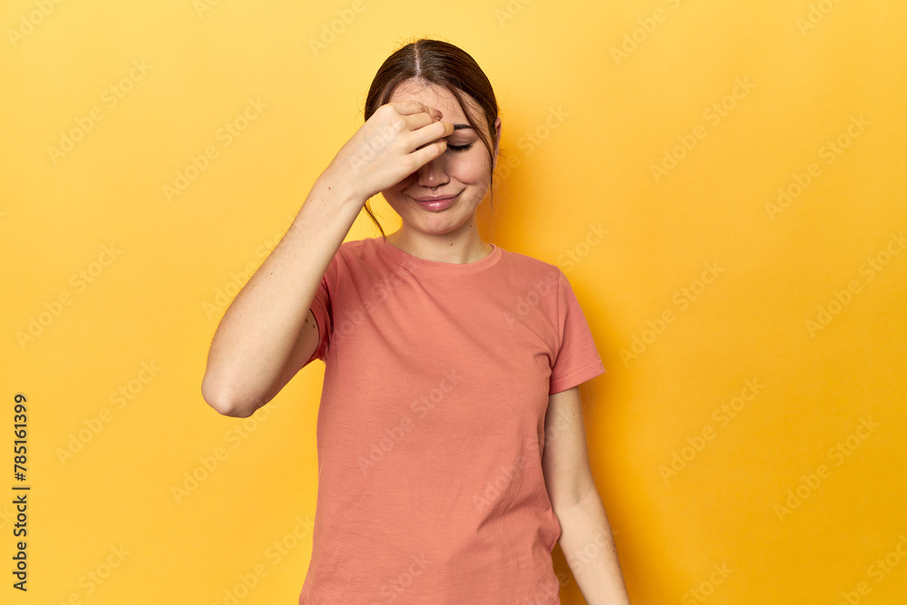 having a head ache, touching front of the face. having a head ache, touching front of the face.