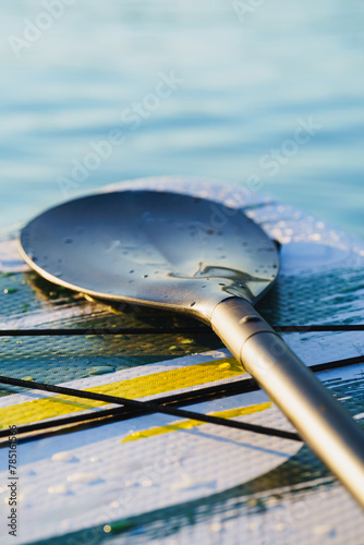 Close up of a Stand Up Paddle surf board or SUP on the water.