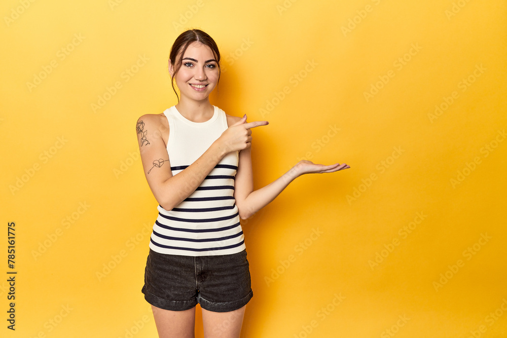 excited holding a copy space on palm.