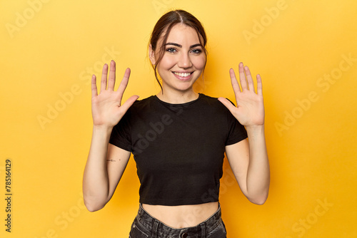 showing number ten with hands. photo