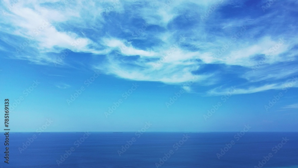 Endless Indian Ocean and the blue, cloudy sky