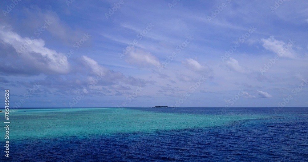 Aerial drone shot of the tranquil Indian Ocean near the Maldives Aerial drone shot of the tranquil Indian Ocean near the Maldives