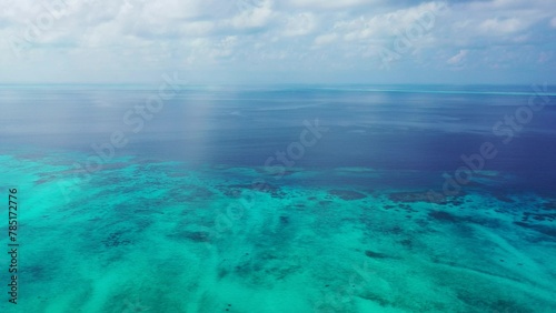 Beautiful view of a calm blue sea on sunny day in Asia © Wirestock