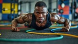 Energetic Athlete Performing Challenging Circuit Training Exercises for Full Body Workout in Fitness Facility