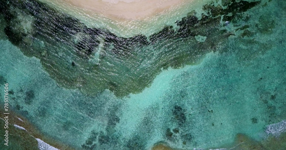 Fototapeta premium Bird's eye view of the azure water of the ocean in Asia