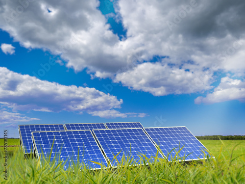 Solar panels. Lawn with sun...