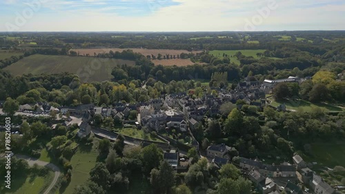 Aerial forward over Rochefort-en-Terre medieval and picturesque village, Brittany in France photo