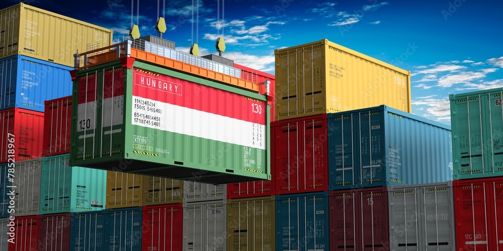 Fototapeta premium Freight shipping container with flag of Hungary on crane hook - 3D illustration
