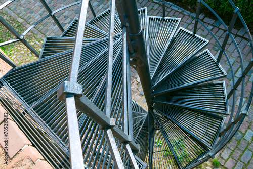 Spiral metal staircase outside the building.
