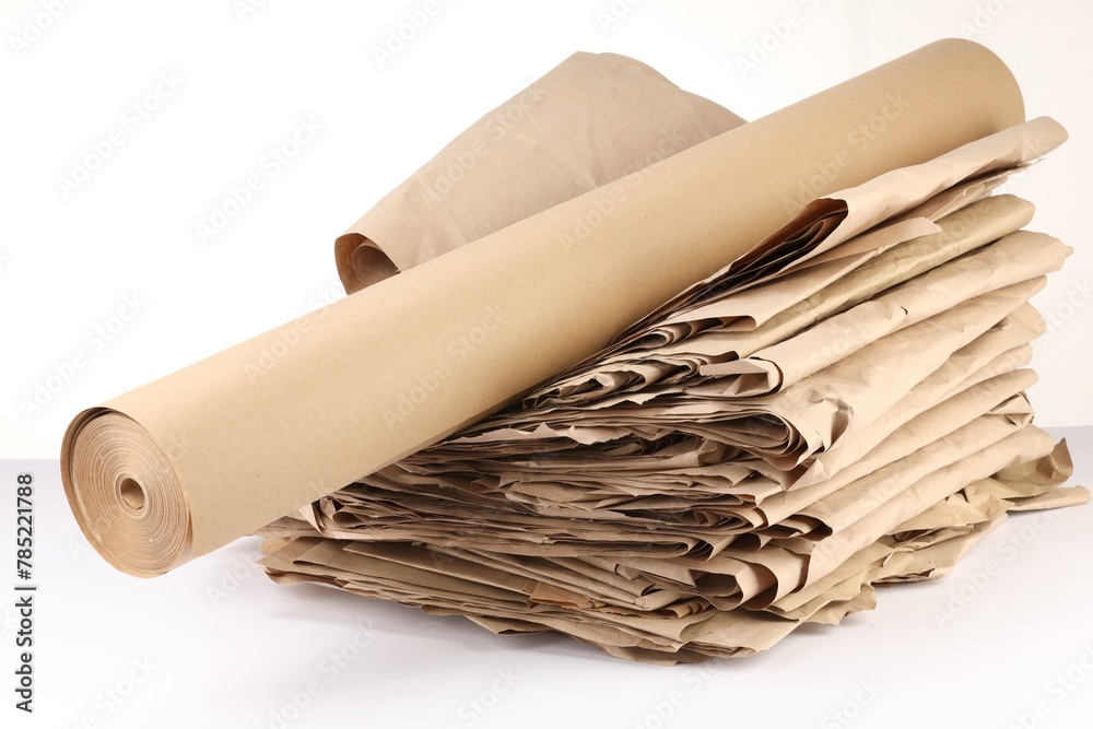 Naklejka premium Stack of waste paper isolated on white