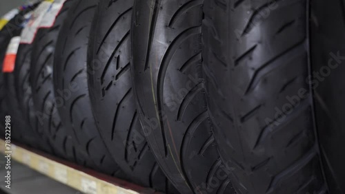 Various kinds of motorbike tires are sold in specialized motorbike tire shops. photo