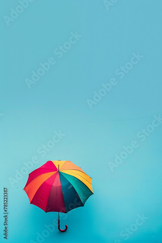 An isolated umbrella on an colorful background